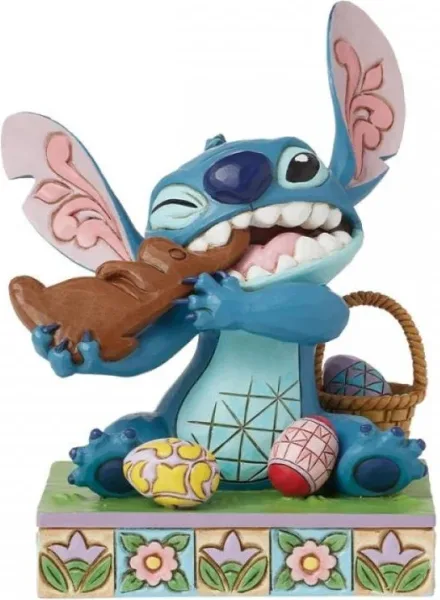 Figura enesco diseny stitch comiendo conejo de chocolate con huevos